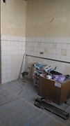 Отделочные работы в новостройке (отштукатурены стены, выложен фартук на кухне) (пр. Жукова).